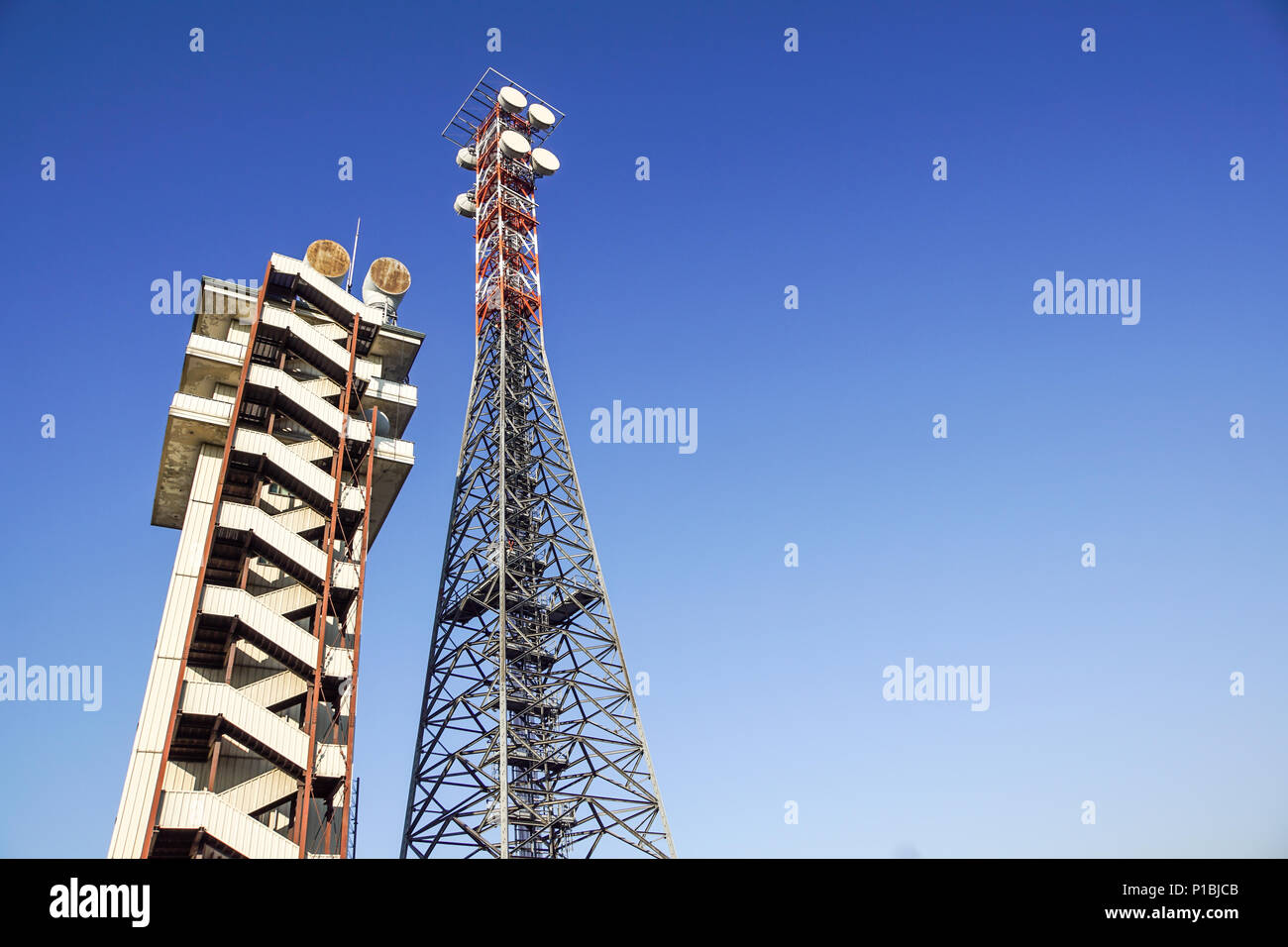 telecommunication tower with the blue sky. Cell Phone Signal Tower, antennas Stock Photo