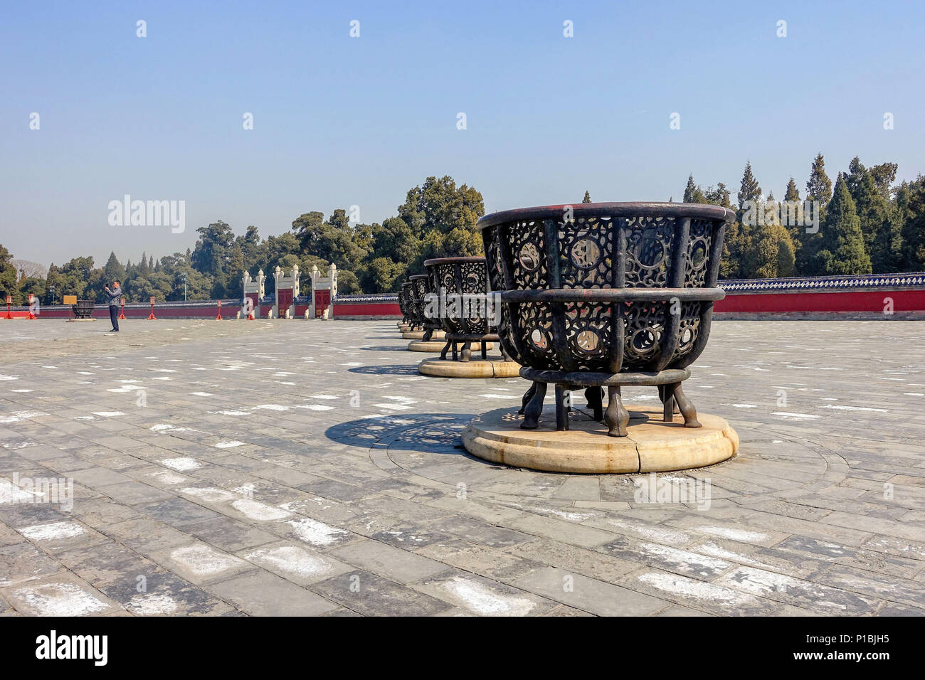BEIJING, CHINA - MARCH 14, 2016: Tourists visiting The Circular Mound Altar at the Temple of Heaven complex. Stock Photo
