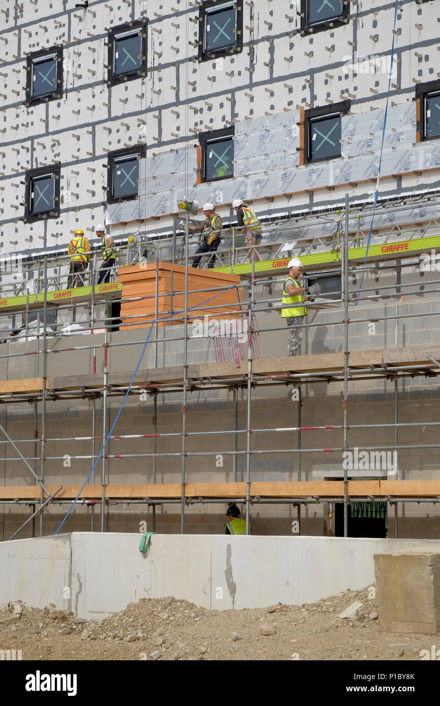 Construction workers on a building site, uk Stock Photo