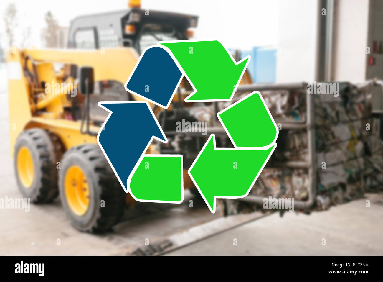 Sign recycling waste. Special transport at the waste processing plant carries garbage for recycling blurred in the background Stock Photo