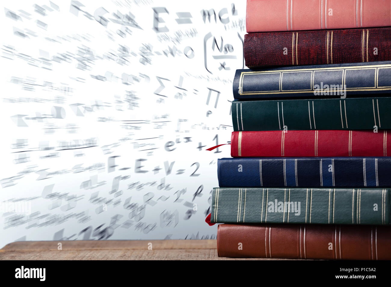 Stack of books on wooden table Stock Photo