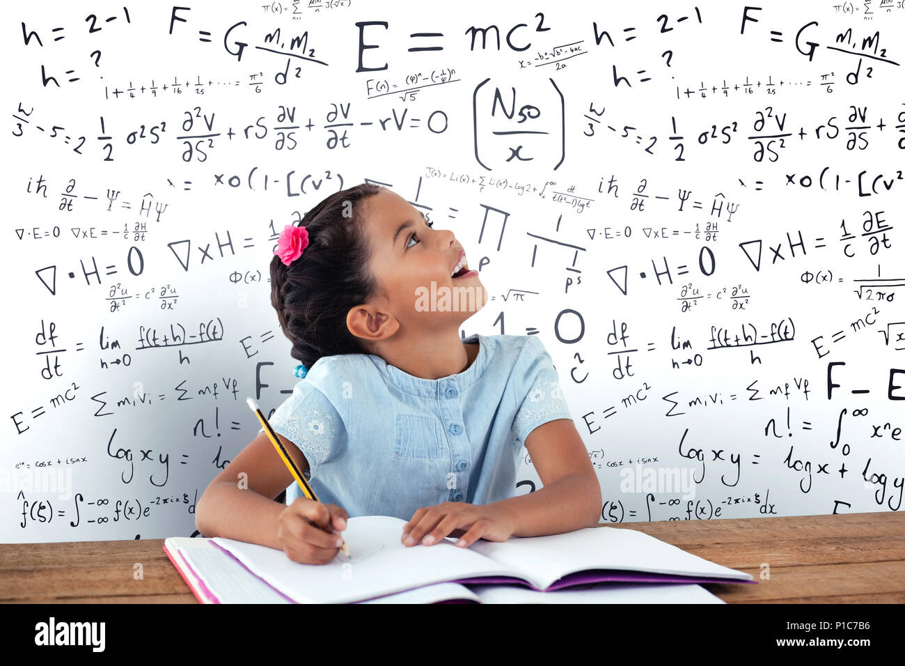 School girl writing homework hi-res stock photography and images - Alamy