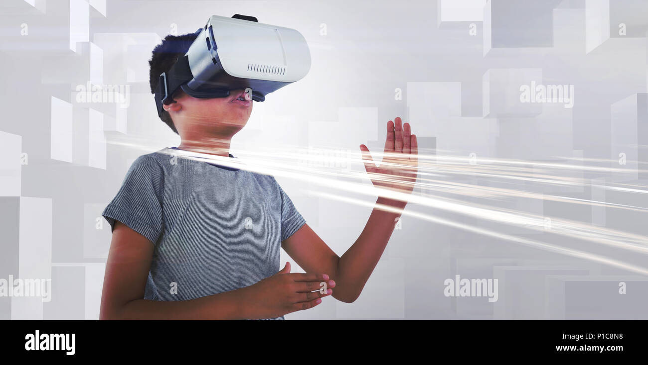 Boy playing using virtual reality headset Stock Photo