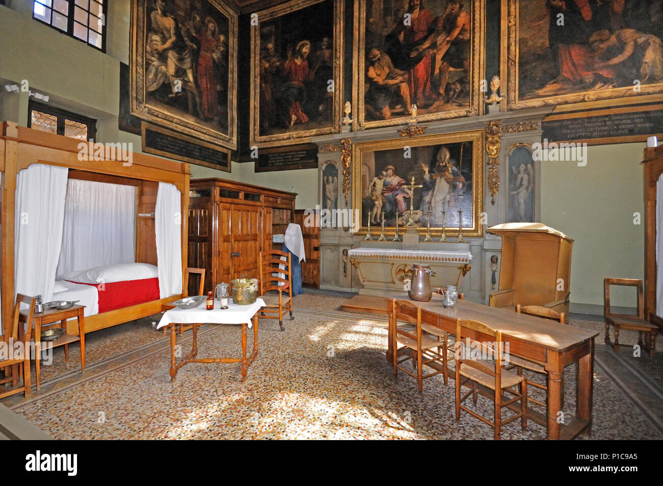 Interior of Saint Hugues Room with medieval paintings altar and nurse ...