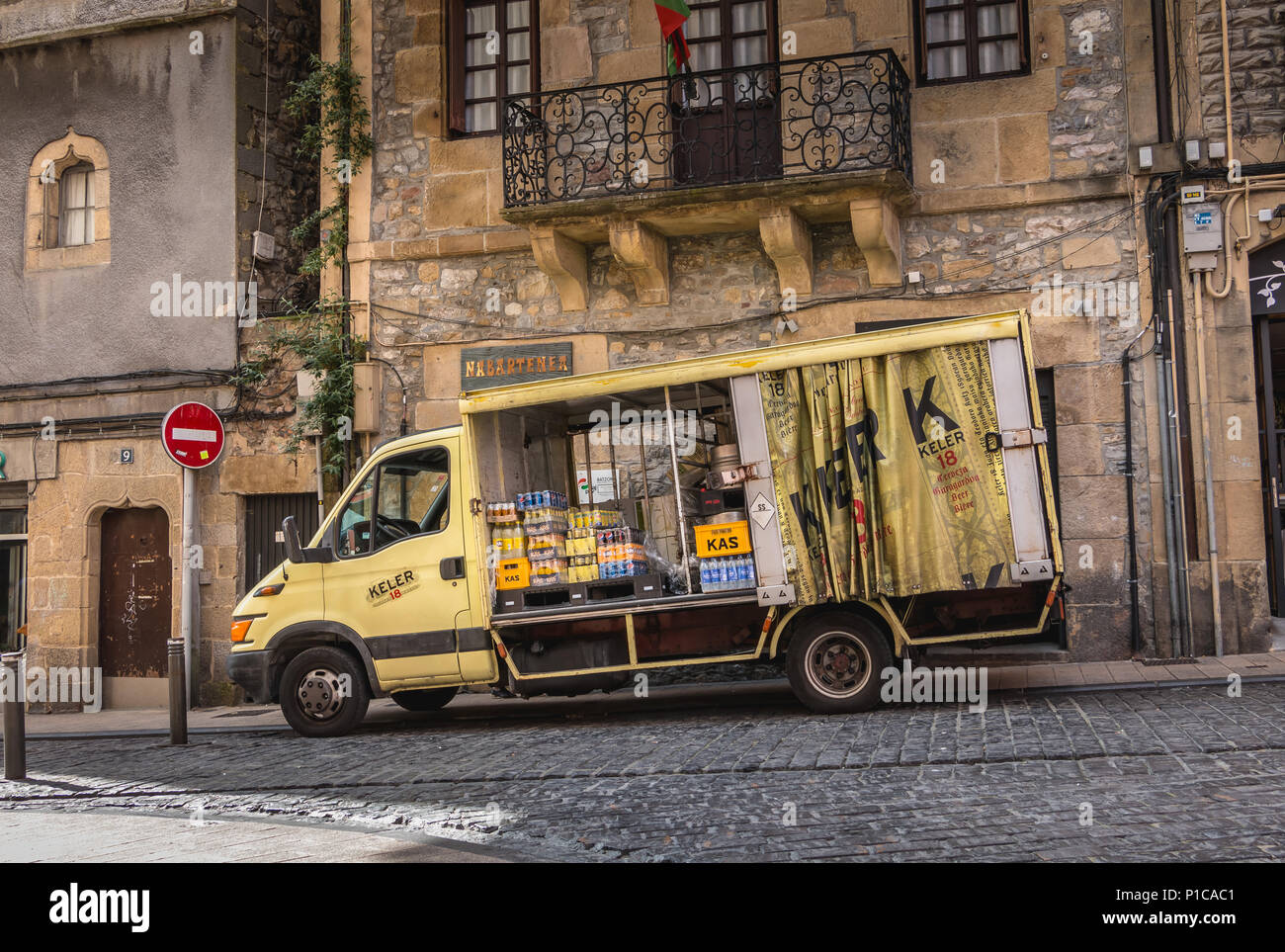 Irun, Spain - April 27, 2018: Delivery truck delivering drinks to city bars on a spring day Stock Photo