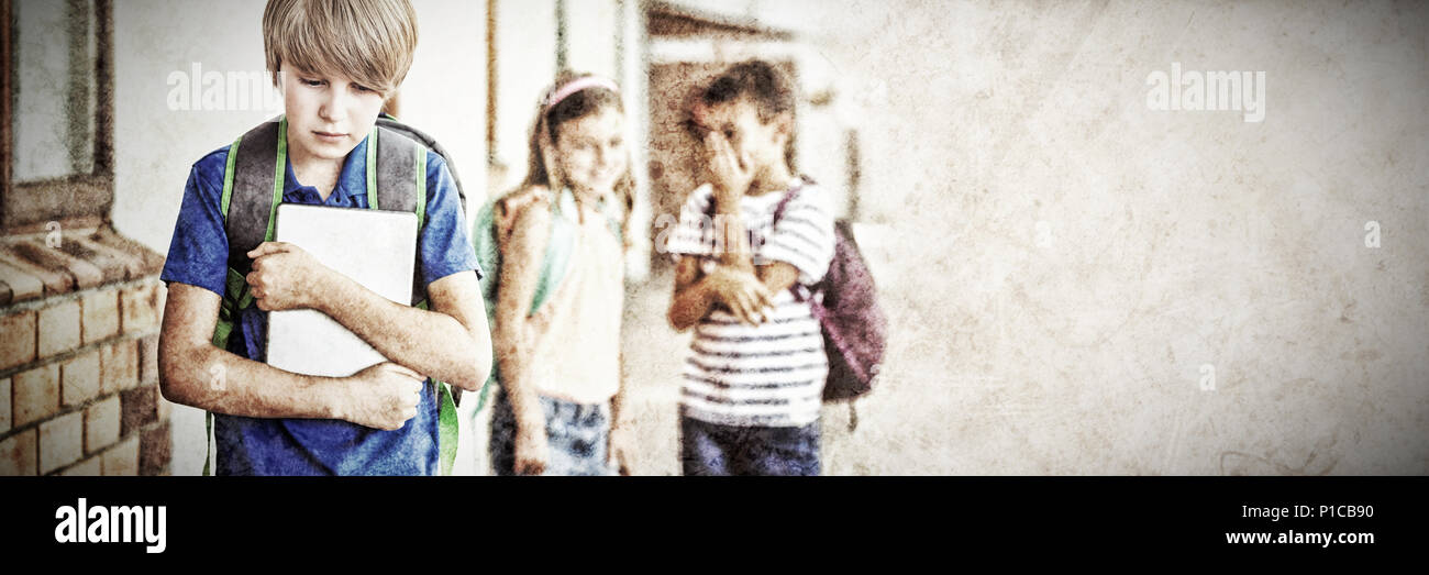 Pupil mocked in the school playground Stock Photo