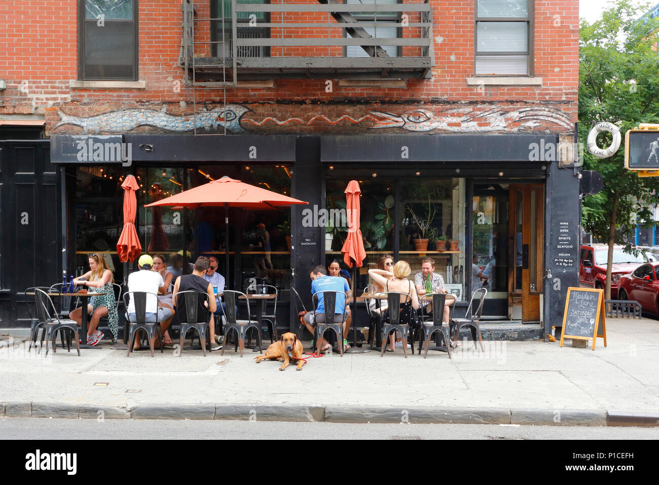 Maiden Lane, 162 Avenue B, New York, NY. exterior storefront of a restaurant, and sidewalk cafe in the East Village neighborhood of Manhattan. Stock Photo