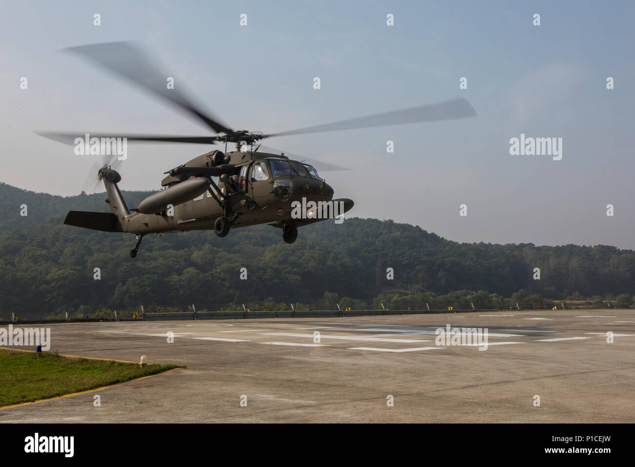 A UH-1Y Venom lands on a helipad in Baran, South Korea, Oct. 15, 2016. Commandant of the Marine Corps Gen. Robert B. Neller visited Baran to meet with Republic of Korea (ROK) Marine Corps Gen. Shin Hyun-joon, commandant of the ROK Marine Corps. (U.S. Marine Corps photo by Cpl. Samantha K. Braun) Stock Photo