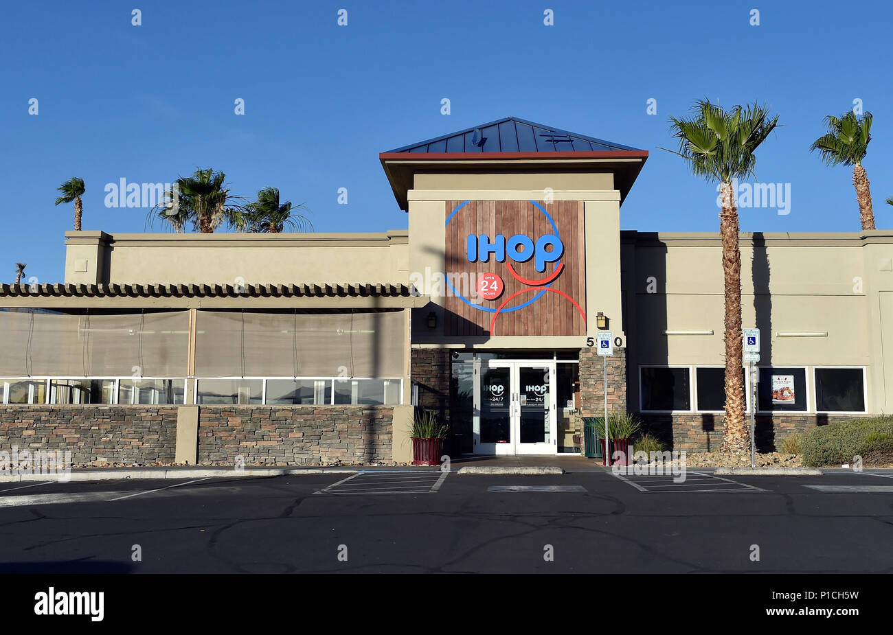 Las Vegas, Nevada, USA. 11th June, 2018. The sign for an IHOP restaurant is  seen in Las Vegas. The International House of Pancakes created a marketing  campaign suggesting it was going to