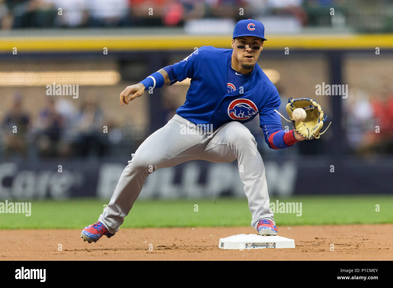 Milwaukee, WI, USA. 11th June, 2018. Chicago Cubs second baseman Javier Baez  #9 turns a double play during the Major League Baseball game between the  Milwaukee Brewers and the Chicago Cubs at