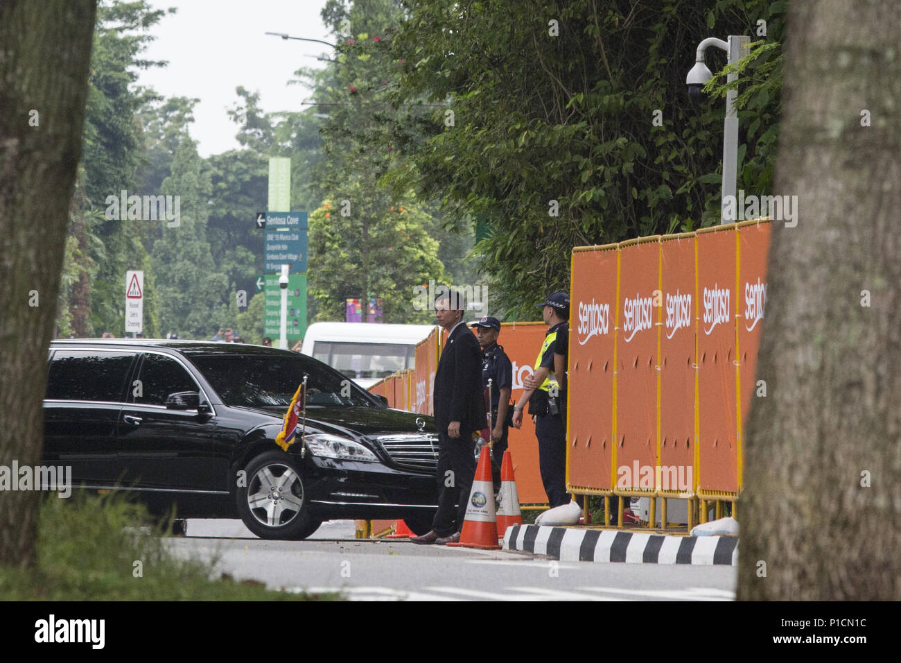 Singapore, Singapore. 12th June, 2018. The motorcade of North Korean  ''DPRK'' Leader Kim Jong Un enters the gate of the Capella Hotel in  Sentosa, an island next to central Singapore. The unprecedented