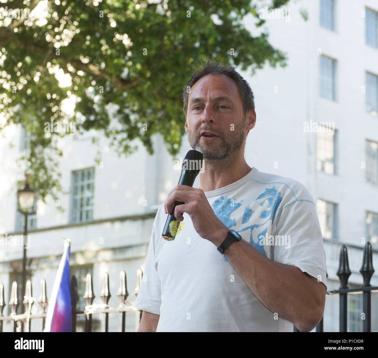 London, UK. 11 June 2018 - London - Leo Kearse - Scottish Comedian of the Year 2017 - perfoming at the anti brexit protest organised by Stop Brexit Ltd, No 10 Vigil, EU Flag Mafia and SODEM. The protest is to support the Article 50 challenge which comes to court on 12 June 2018 which proposes that the invoking of Article 50 to leave the EU was illegal because the decision to leave the EU was never passed by parliament. This part of the protest is opposite Downing Street, London by Richmond Terrace. Further information from rachel@stopbrexitmarch.com  #No10Vigil #remainathon. Credit: Bruce Tann Stock Photo