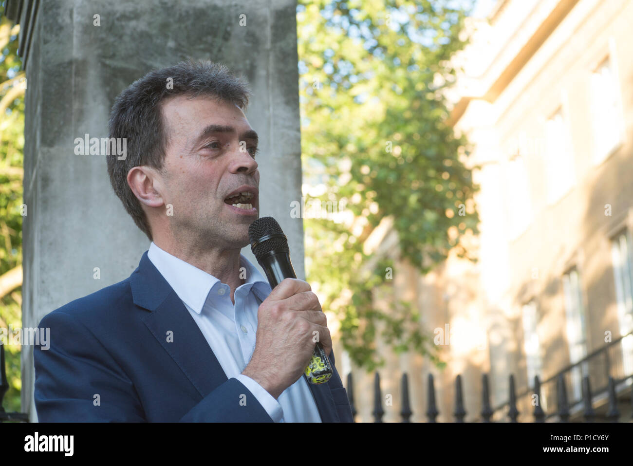 11 June 2018 - London - Tom Brake MP speaking at the anti brexit protest organised by Stop Brexit Ltd, No 10 Vigil, EU Flag Mafia and SODEM. The protest is to support the Article 50 challenge which comes to court on 12 June 2018 which proposes that the invoking of Article 50 to leave the EU was illegal because the decision to leave the EU was never passed by parliament. This part of the protest is opposite Downing Street, London by Richmond Terrace. Further information from rachel@stopbrexitmarch.com  #No10Vigil #remainathon. Stock Photo