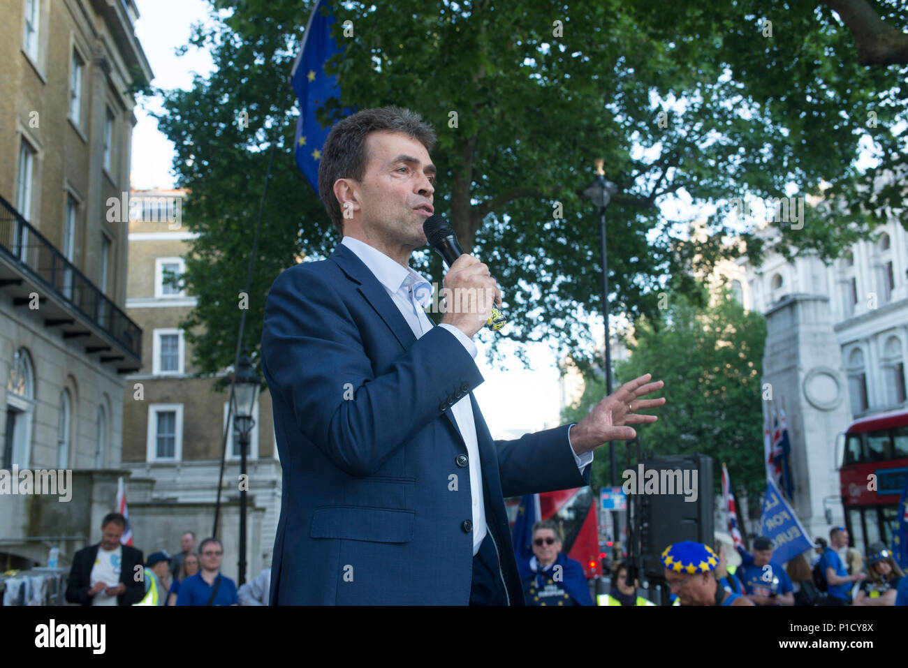 11 June 2018 - London - Tom Brake MP speaking at the anti brexit protest organised by Stop Brexit Ltd, No 10 Vigil, EU Flag Mafia and SODEM. The protest is to support the Article 50 challenge which comes to court on 12 June 2018 which proposes that the invoking of Article 50 to leave the EU was illegal because the decision to leave the EU was never passed by parliament. This part of the protest is opposite Downing Street, London by Richmond Terrace. Further information from rachel@stopbrexitmarch.com  #No10Vigil #remainathon. Stock Photo