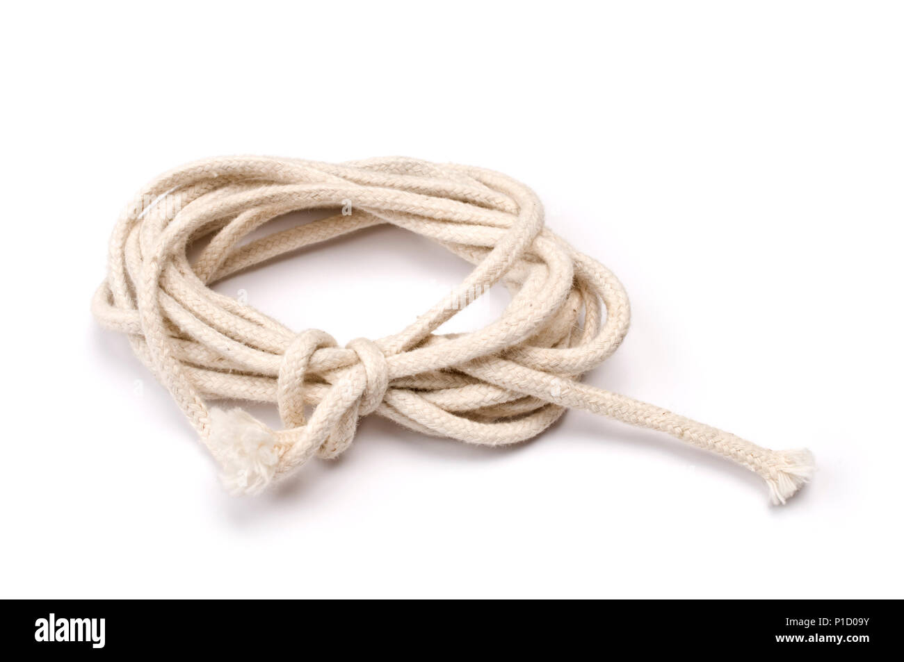 Tangled rope on white background. Stock Photo