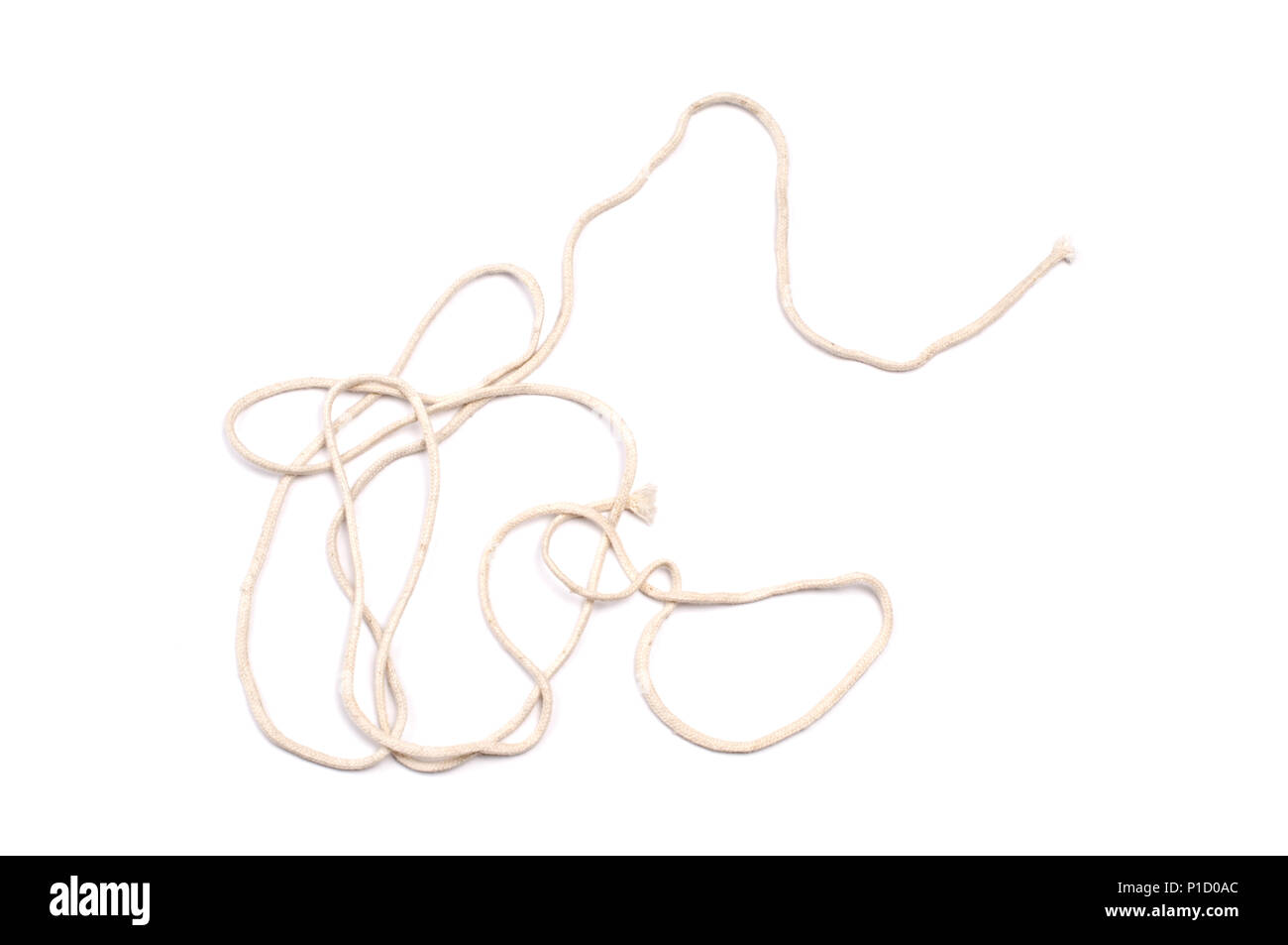 Several pieces of brown string on a white background Stock Photo - Alamy