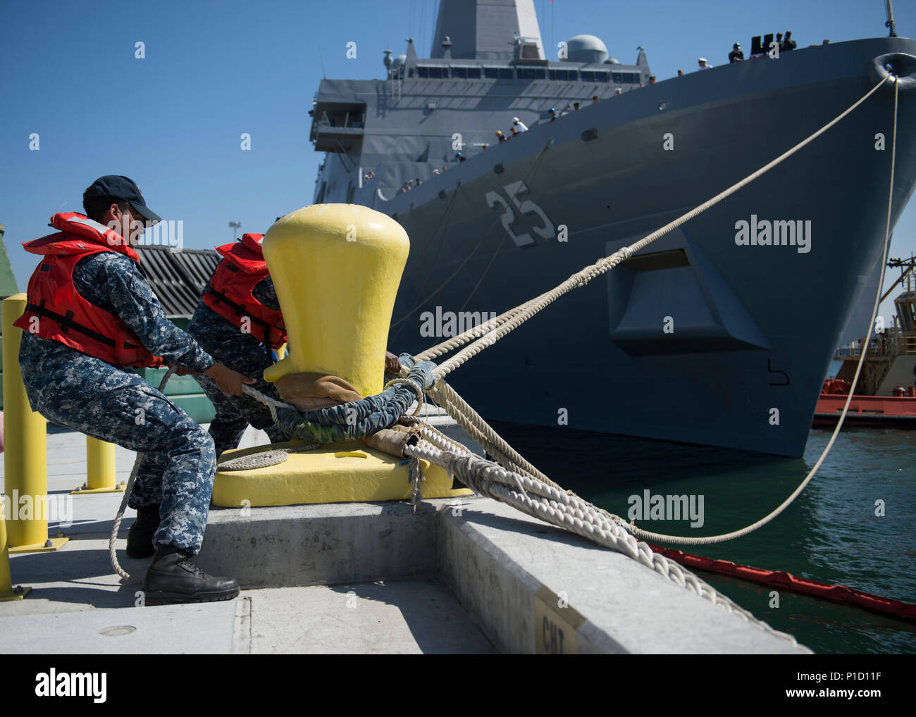 SAN DIEGO (Oct. 14, 2016) — Line handlers assigned to Naval Base San ...