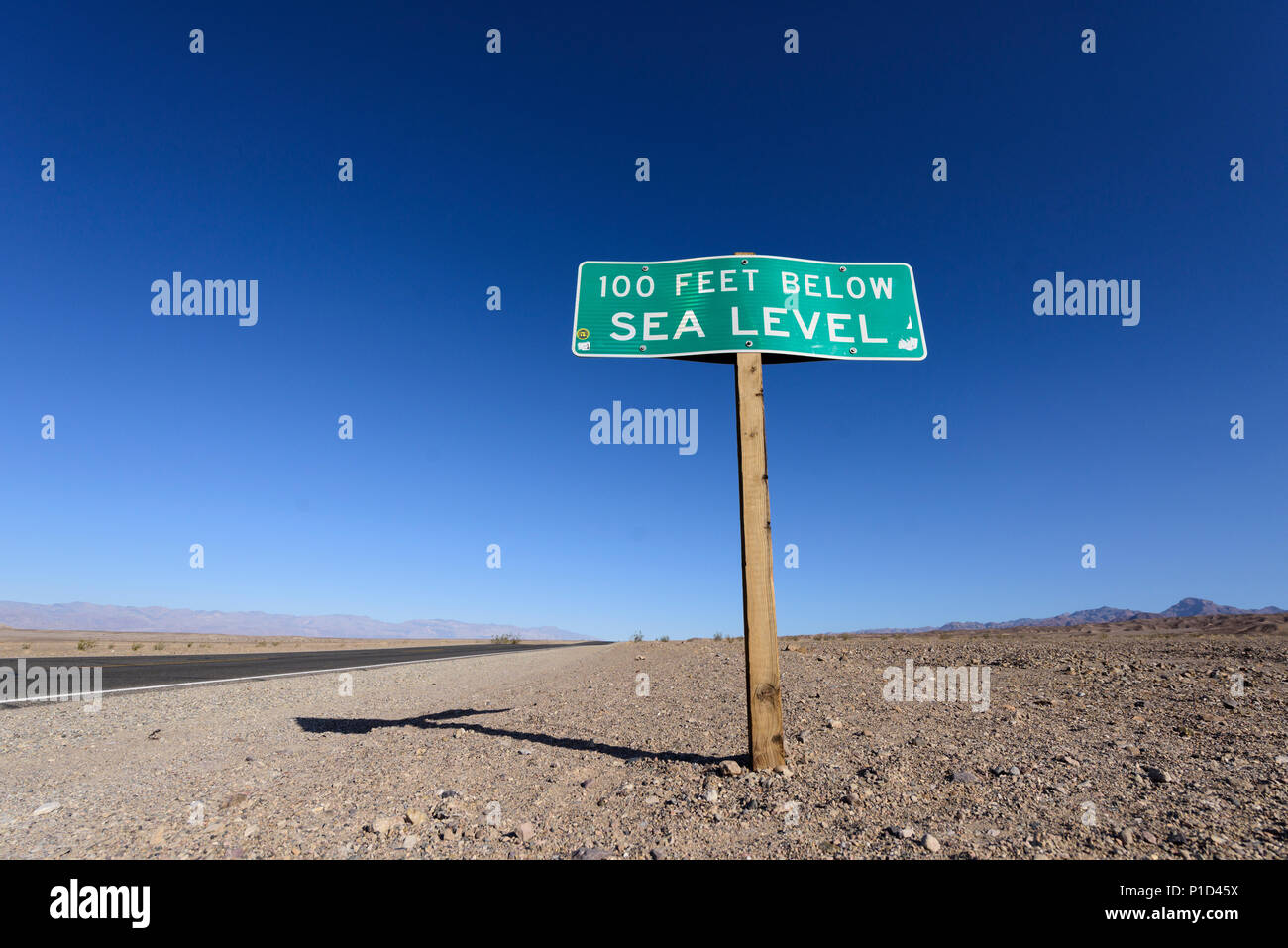 Death Valley National Park badlands 100 feet below sea level sign. Stock Photo