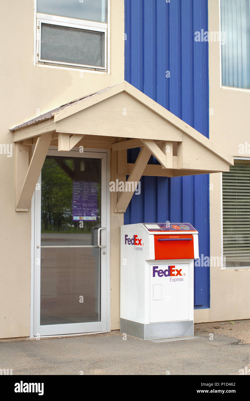 TRURO, CANADA - JUNE 10, 2018: FedEx drop off delivery box. FedEx Corporation is an American courier company based in Memphis, Tennessee and operates  Stock Photo