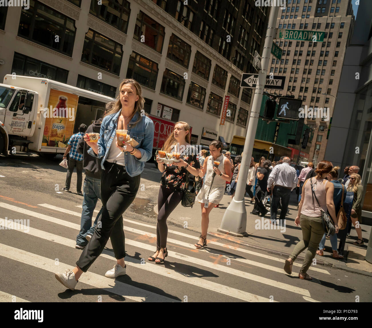 Garment Center workers on a coffee run in New York, prior to the great