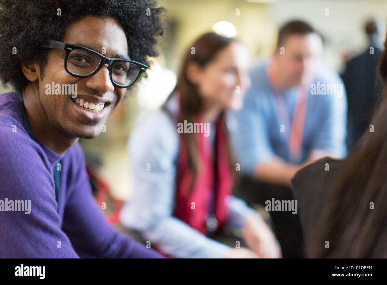 Portrait smiling, confident businessman in eyeglasses Stock Photo