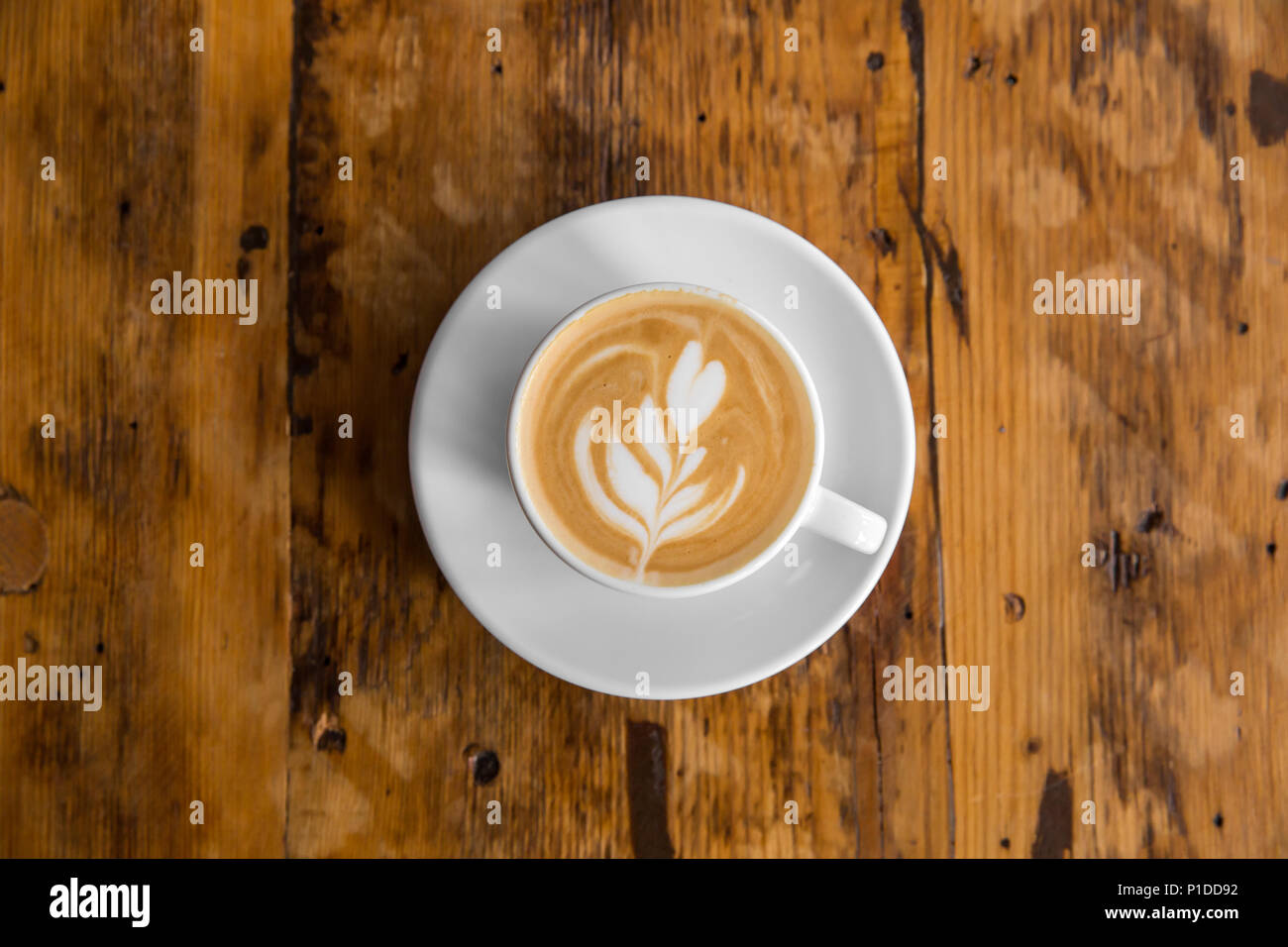 Cup Of Coffee To Go On The Wooden Table With Latte Art Street Top View Cup Of Coffee To Go On The Wooden Table With Latte Art Street Top View