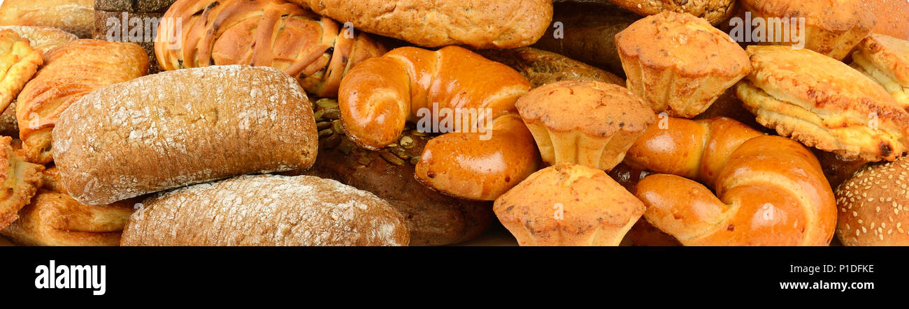 Panoramic collection of bread products (rolls, baguettes, cereal bread, muffins, ciabatta, croissants) Stock Photo