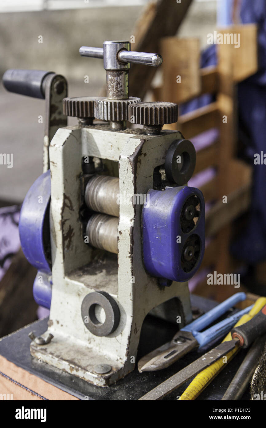 Manual and old riveting machine, tool detail for leather Stock Photo