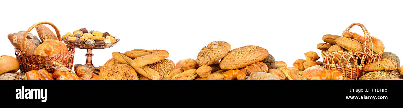 Panorama of fresh bread products isolated on white background. Stock Photo
