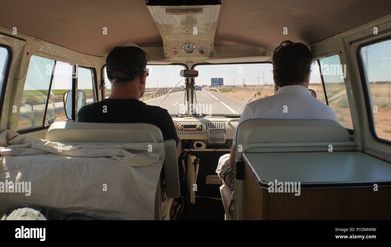 Road trip in a split screen Volkswagen van. Stock Photo