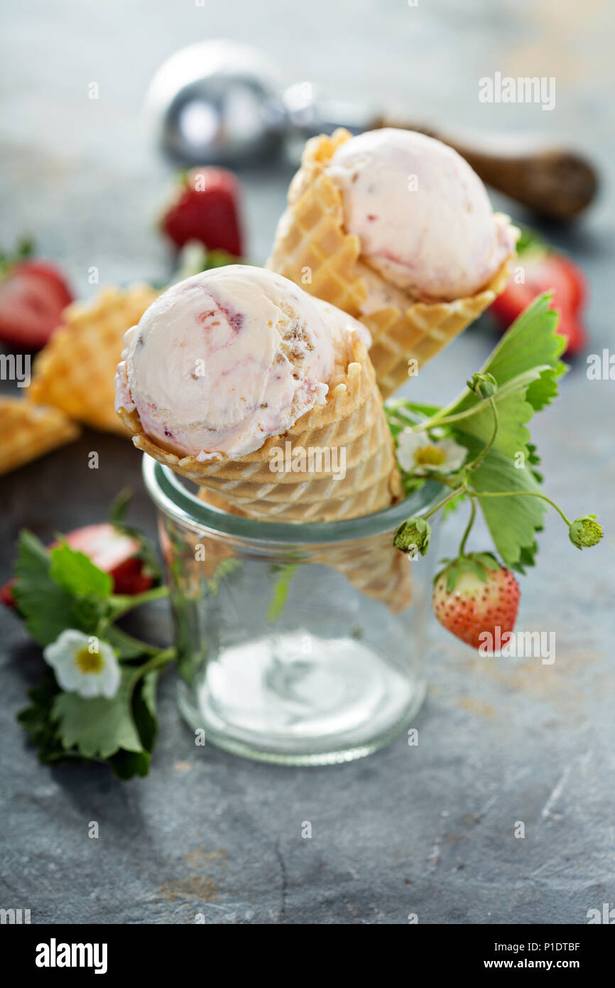 Strawberry ice cream in waffle cones Stock Photo Alamy