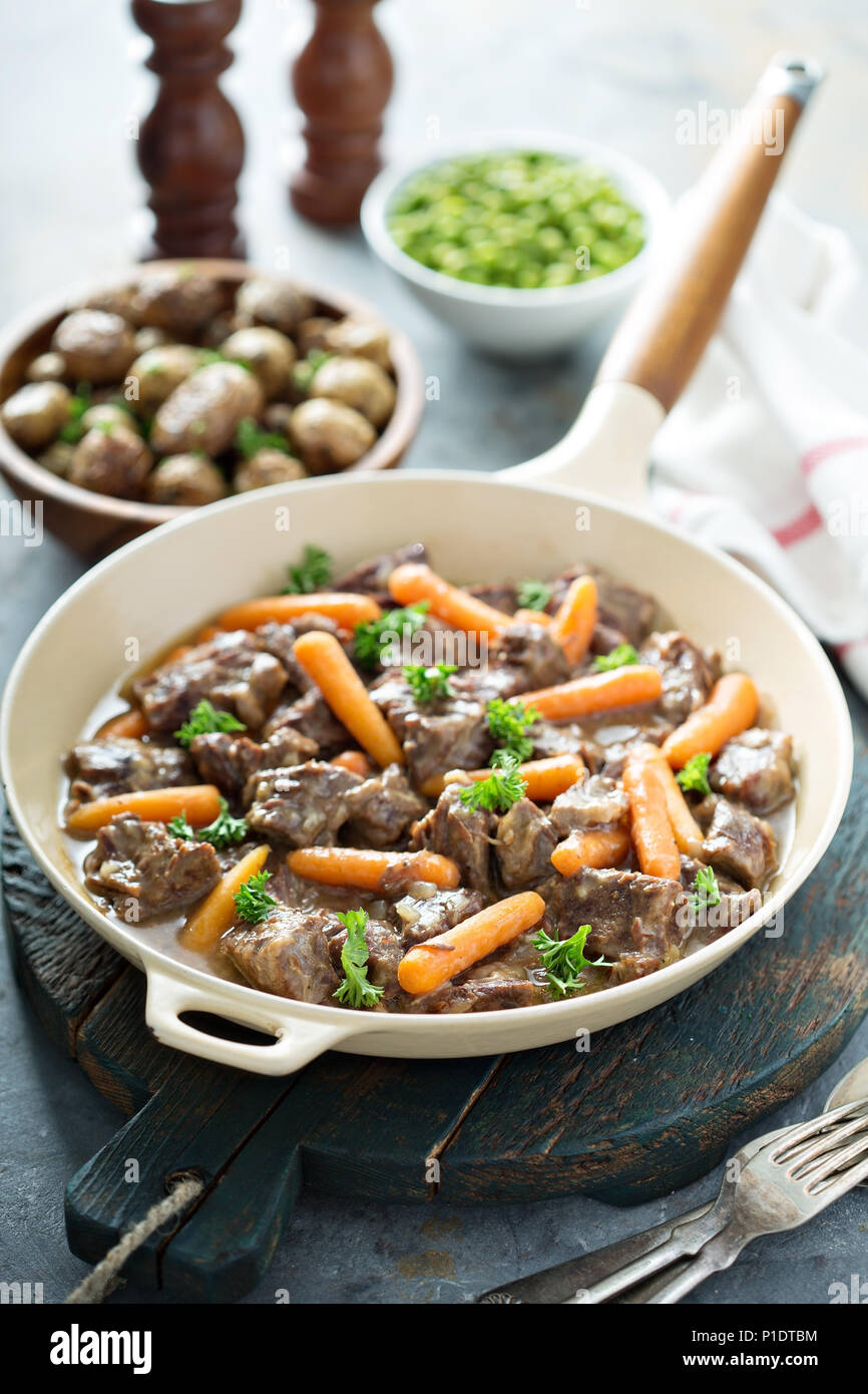 Beef stew with carrots and parsley Stock Photo Alamy