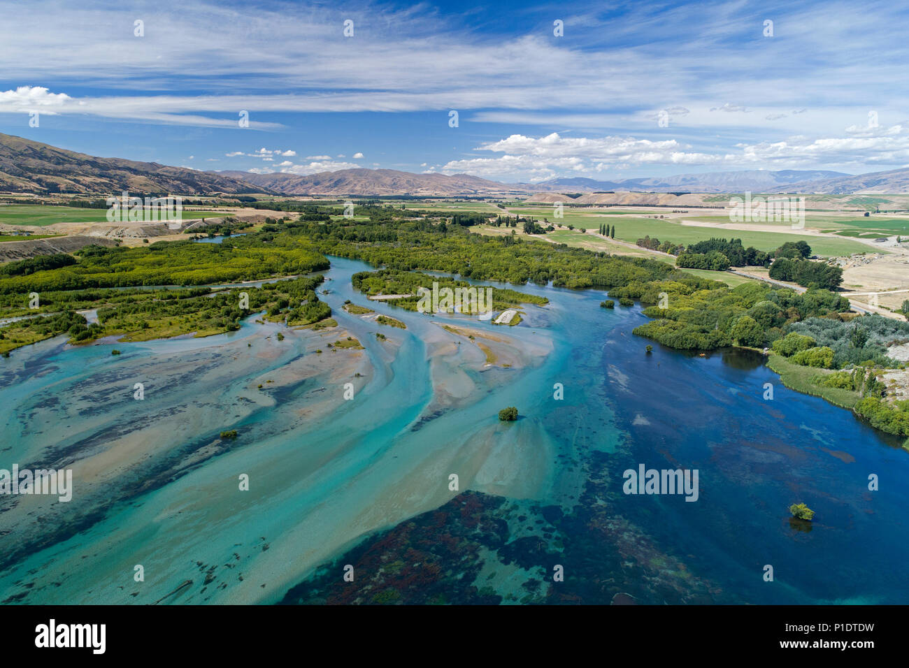 Clutha River entering Lake Dunstan, Central Otago, South Island, New Zealand - drone aerial Stock Photo