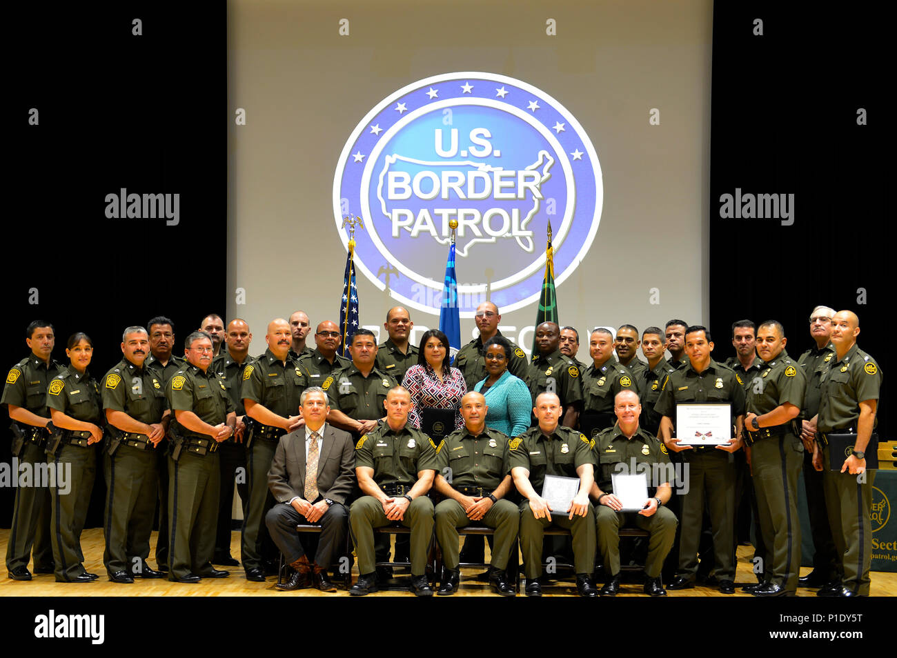 Laredo Border Patrol Sector conducts a promotion and awards ceremony in Laredo, Texas, Oct. 5, 2016. During the ceremony, Sgt. Josue Gonzalez, border patrol agent and traditional guardsman with the 836th Engineer Company, Texas National Guard was awarded the Law Enforcement Congressional Badge of Bravery. (U.S. Army National Guard photo by Sgt. Elizabeth Pena) Stock Photo