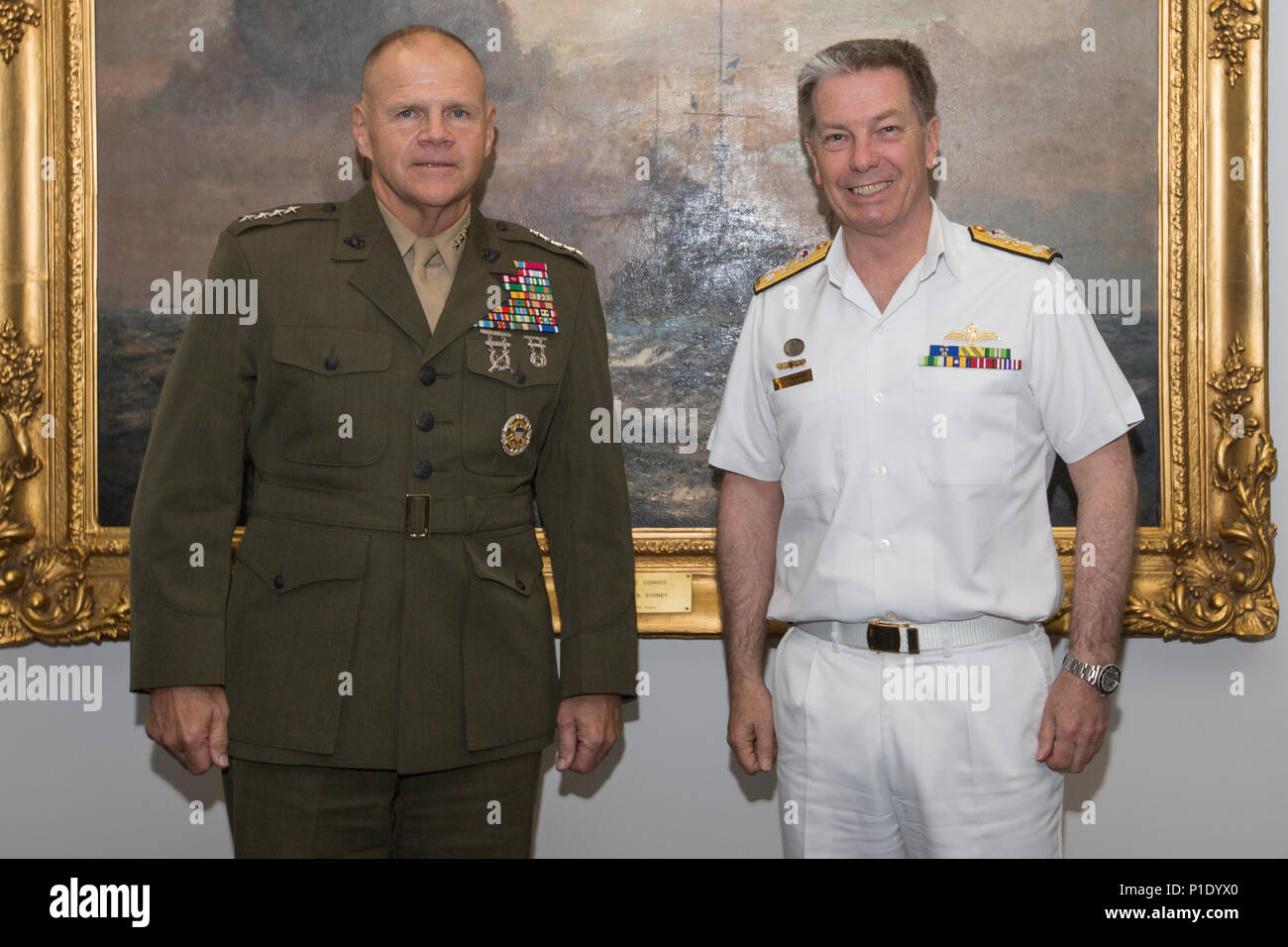 Commandant of the Marine Corps Gen. Robert B. Neller, left, poses for a photo with Vice Adm. Tim Barrett, chief of Navy, at the Russell Offices, Canberra, Australia, Oct. 18, 2016. Neller visited the Russell Offices to meet with Australian military leaders and to strengthen the military-to-military relationship between the two countries. (U.S. Marine Corps photo by Cpl. Samantha K. Braun) Stock Photo
