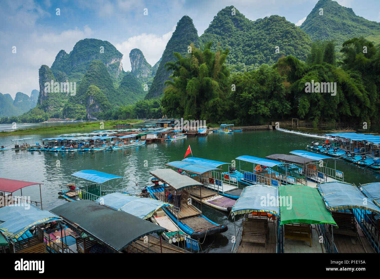 XINGPING, CHINA - MAY 29, 2018: Li River (Lijiang River). Pleasure boats at the pier in Xingping Town Stock Photo