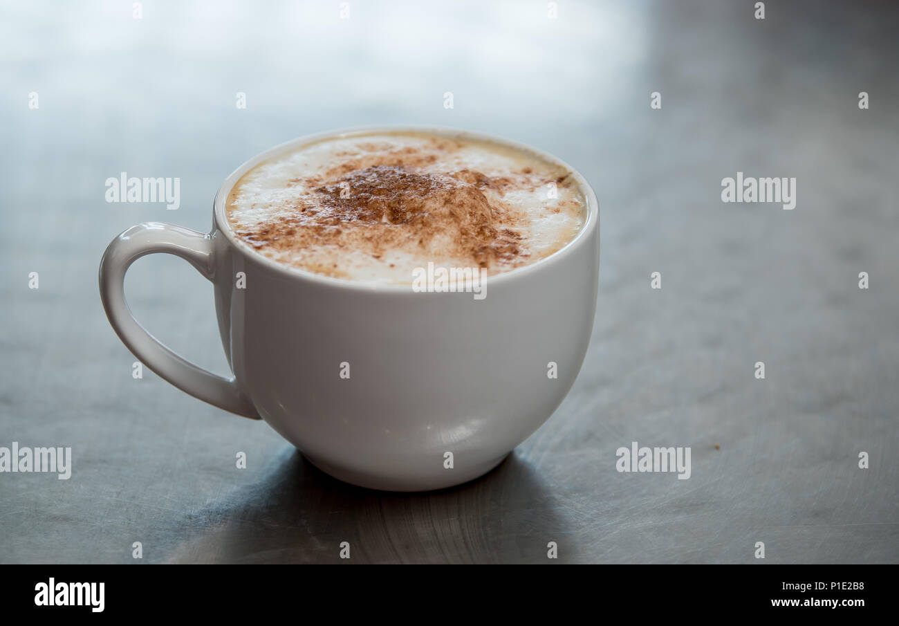 Coffee's on a table. Cappuccino. latte and an americano. Stock Photo