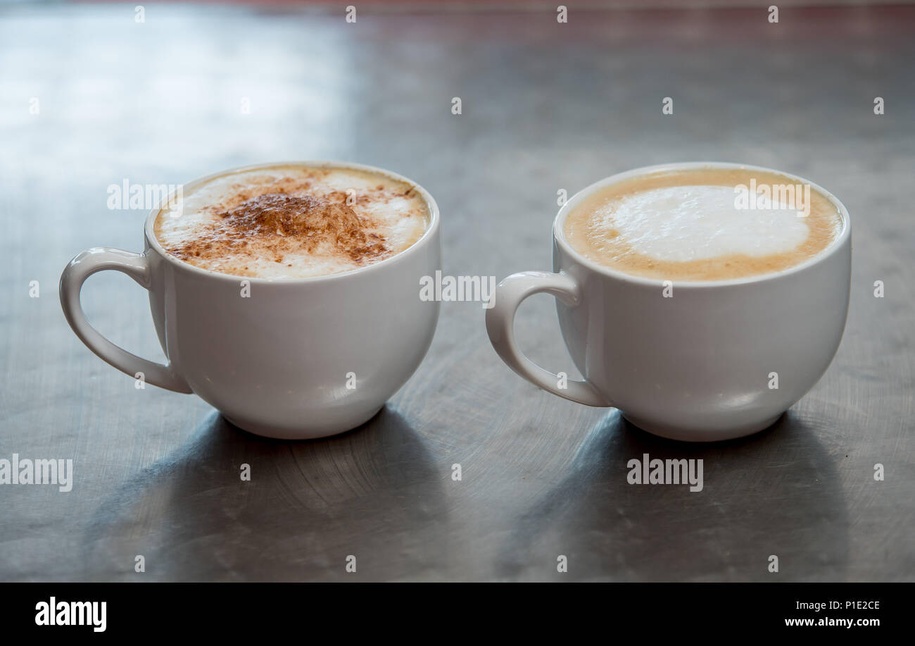 Coffee's on a table. Cappuccino. latte and an americano. Stock Photo