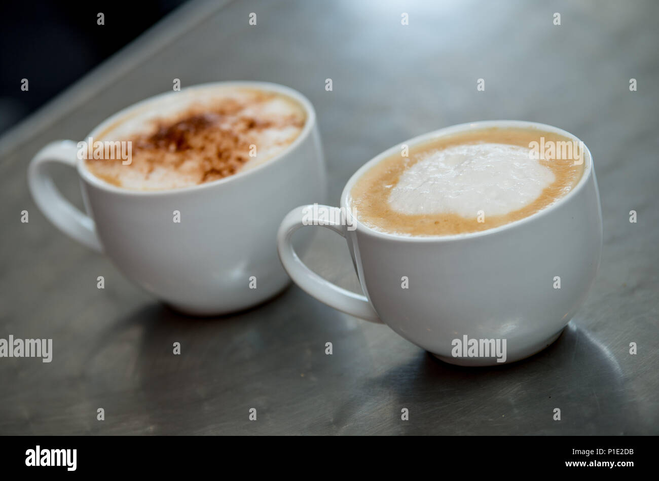 Coffee's on a table. Cappuccino. latte and an americano. Stock Photo