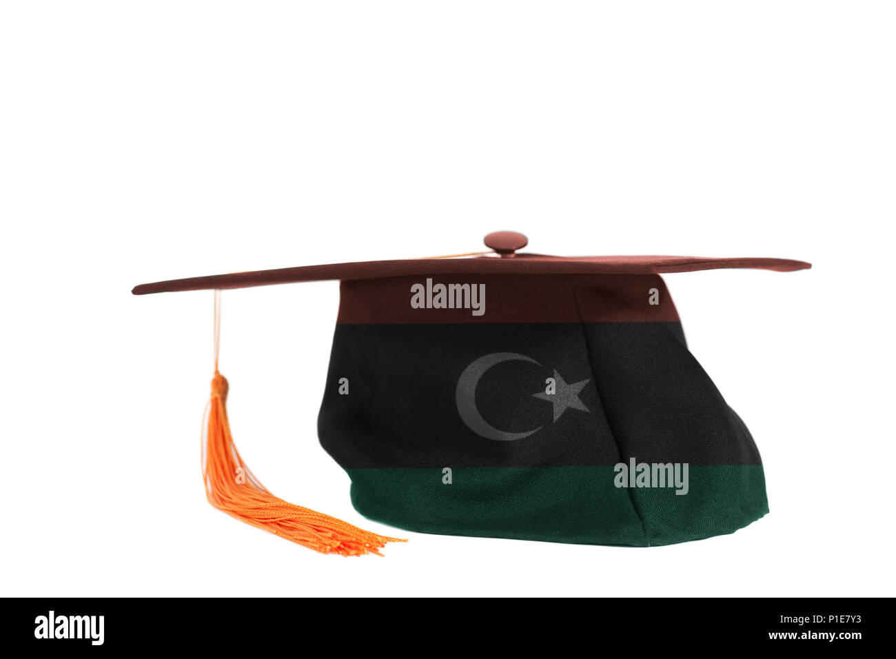 National Flag of Libya on Graduation Cap isolated on a white background Stock Photo
