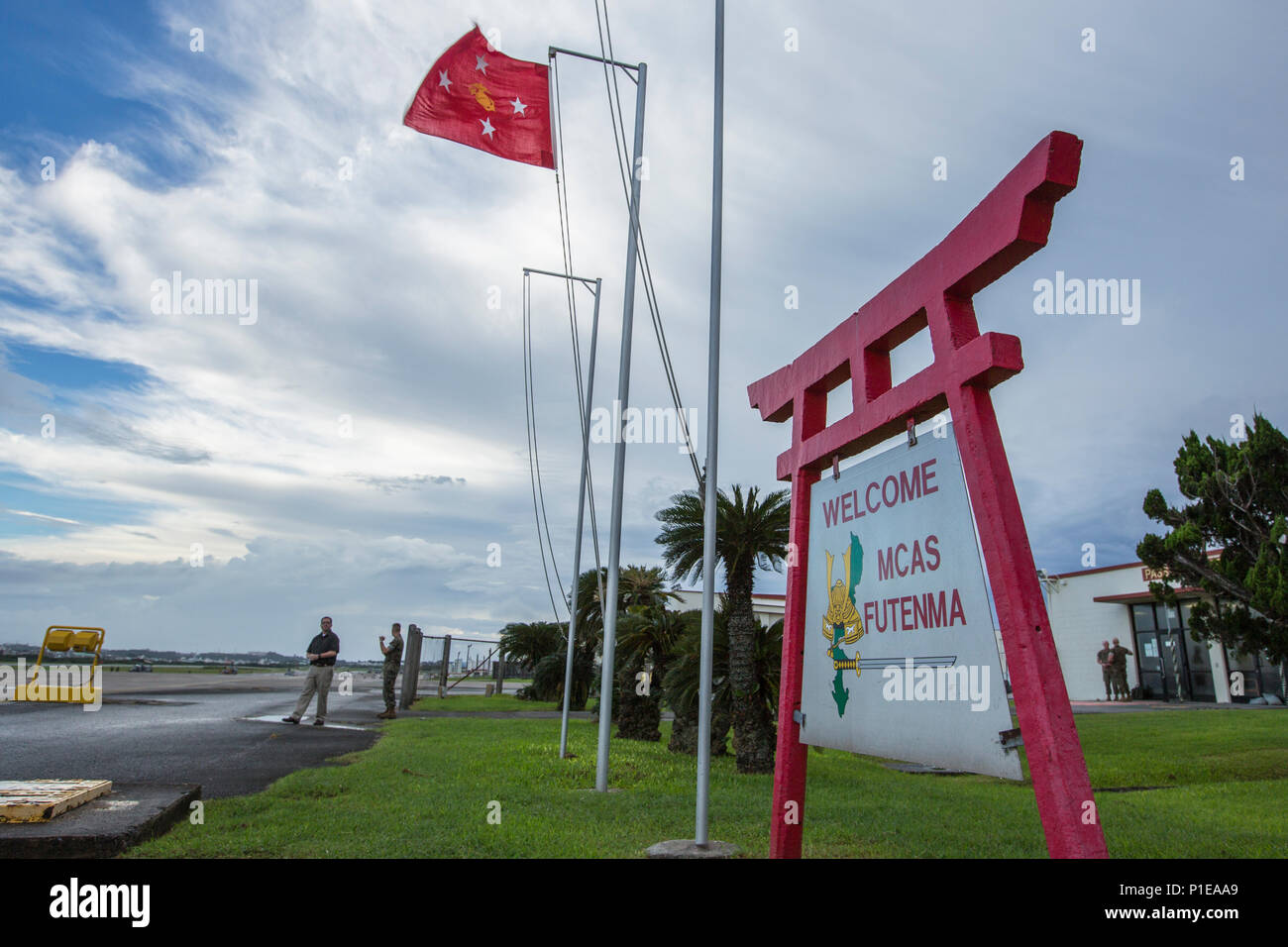 The official flag of the Commandant of the Marine Corps flies at Marine Corps Air Station Futenma, Okinawa, Japan, Oct. 14, 2016. Commandant of the Marine Corps Gen. Robert B. Neller visited Okinawa to tour facilities and meet with Marines. (U.S. Marine Corps photo by Cpl. Samantha K. Braun) Stock Photo