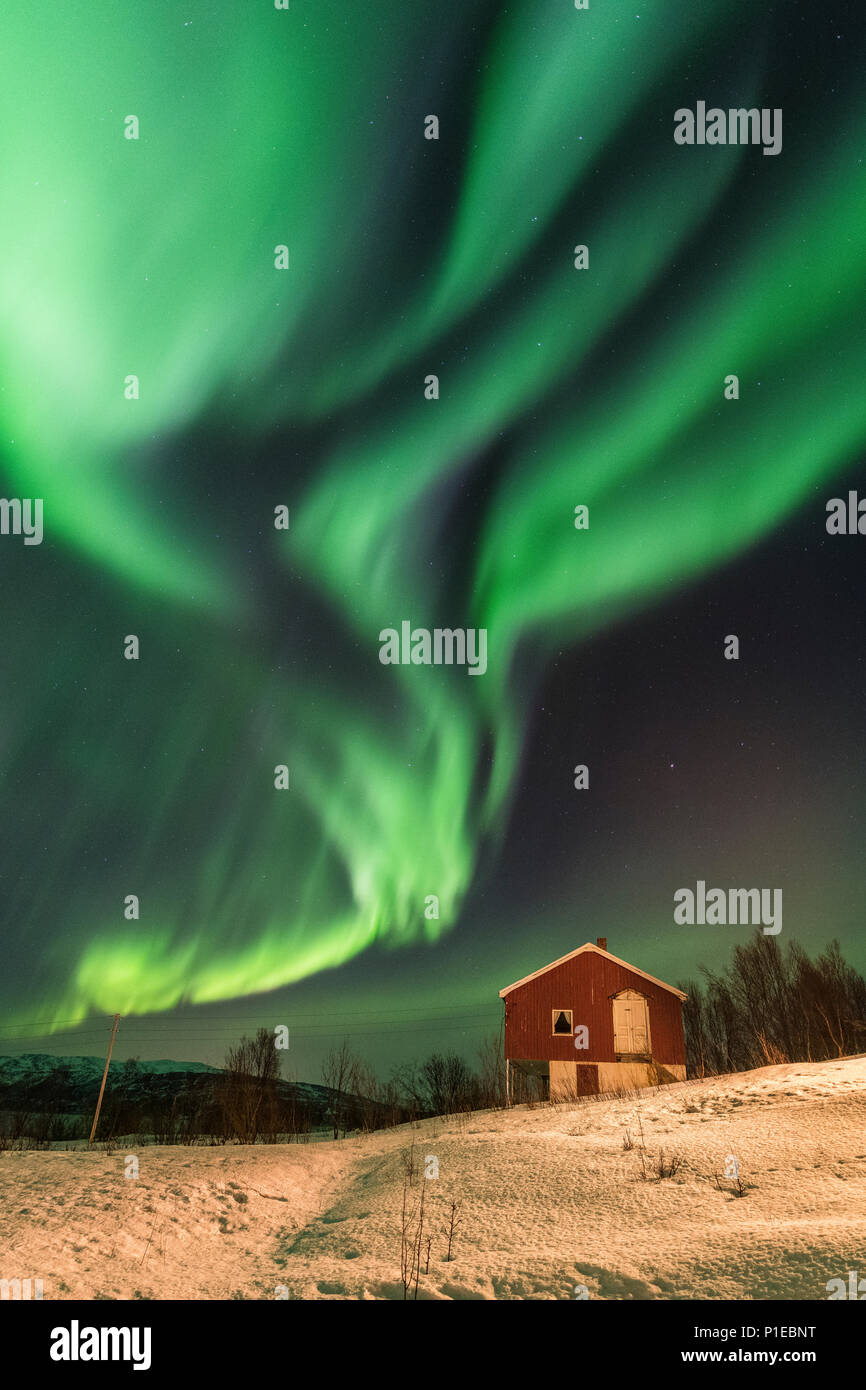 Northern lights over the Stønesbotn at night, Senja, Norway Stock Photo