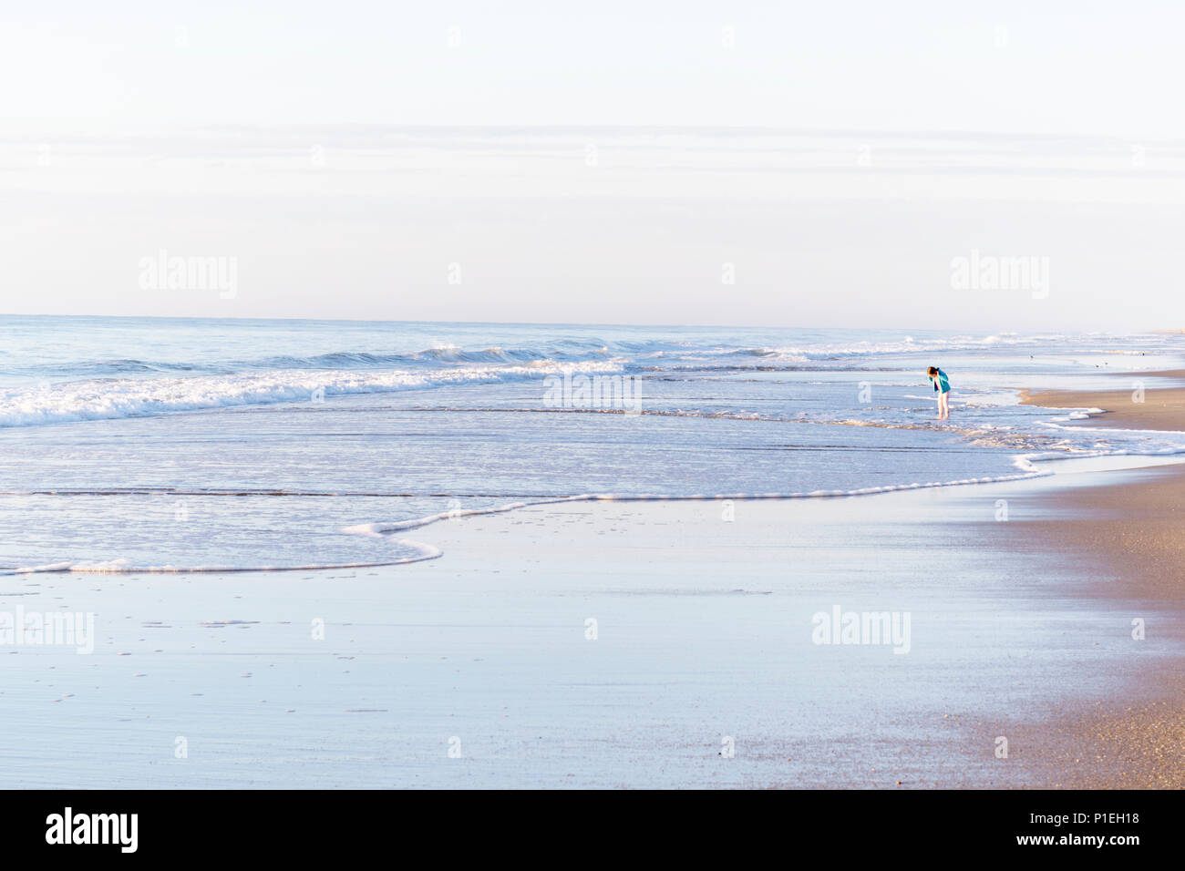 Alone on the beach Stock Photo - Alamy