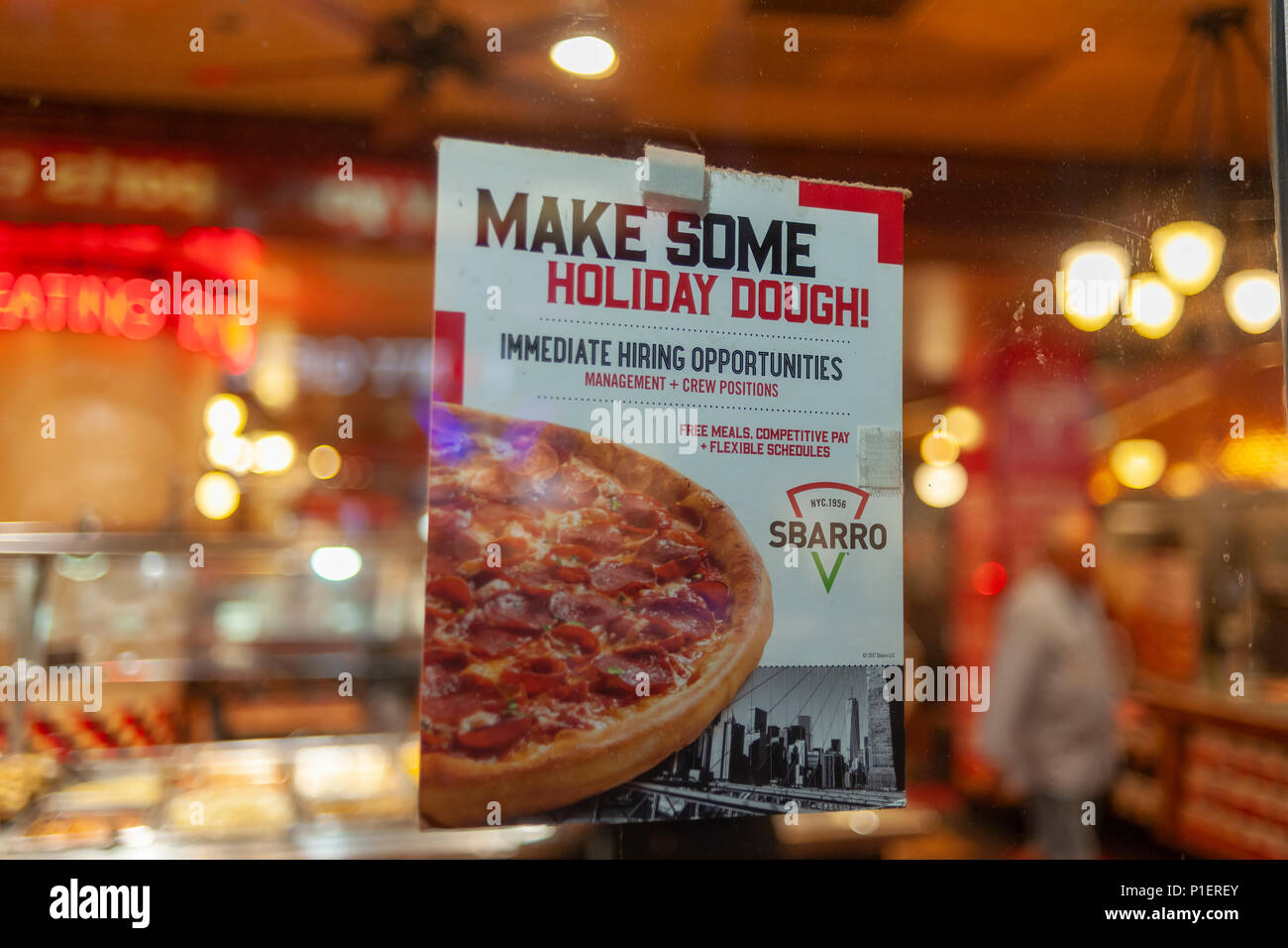 A sign in the window of a Sbarro Italian restaurant in New York advises potential job applicants of the opportunities available in the restaruant industry, seen on Tuesday, May 29, 2018.  (Â© Richard B. Levine) Stock Photo