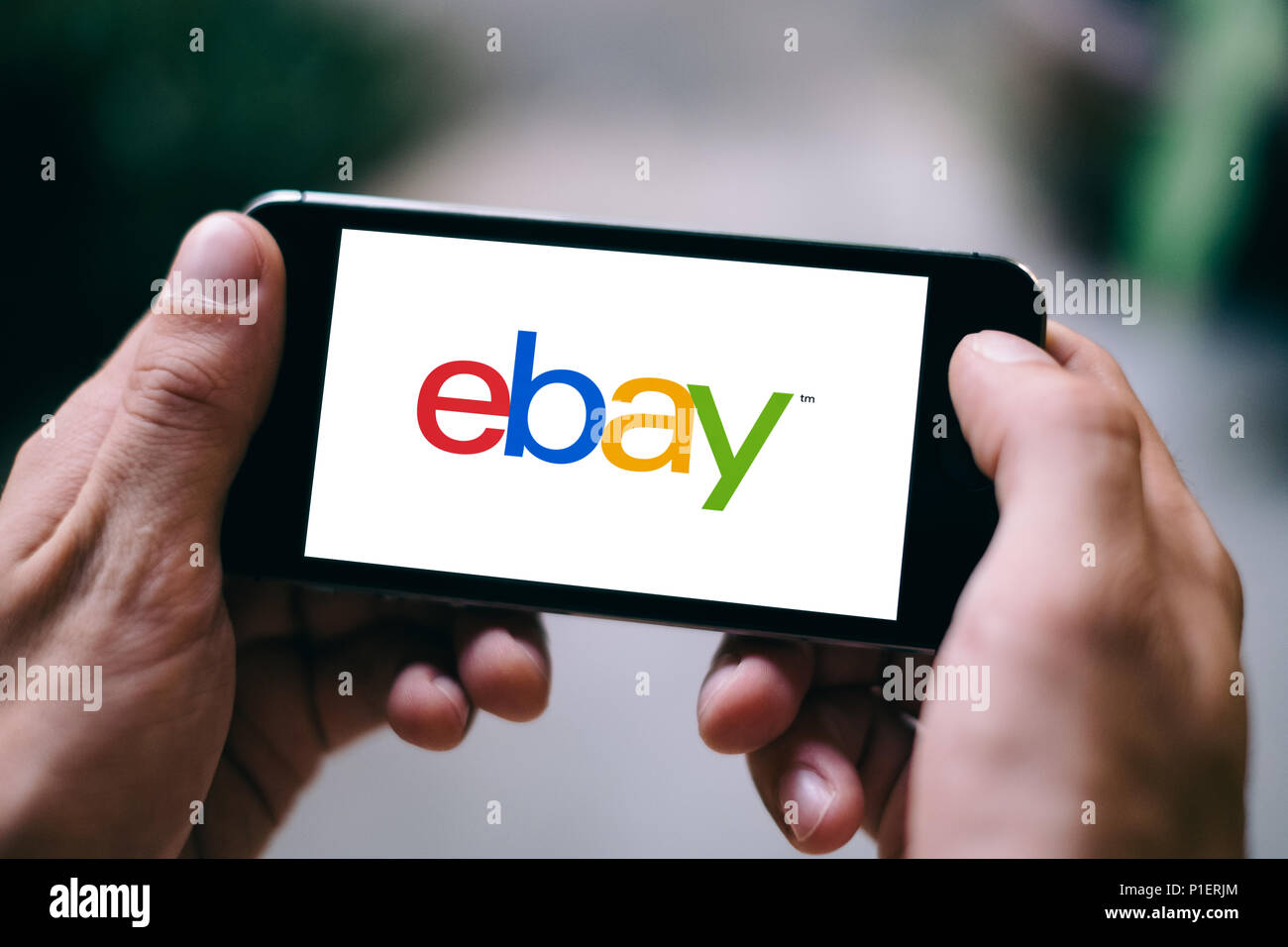 Closeup of iPhone Screen with eBay LOGO or ICON on smartphone Stock Photo