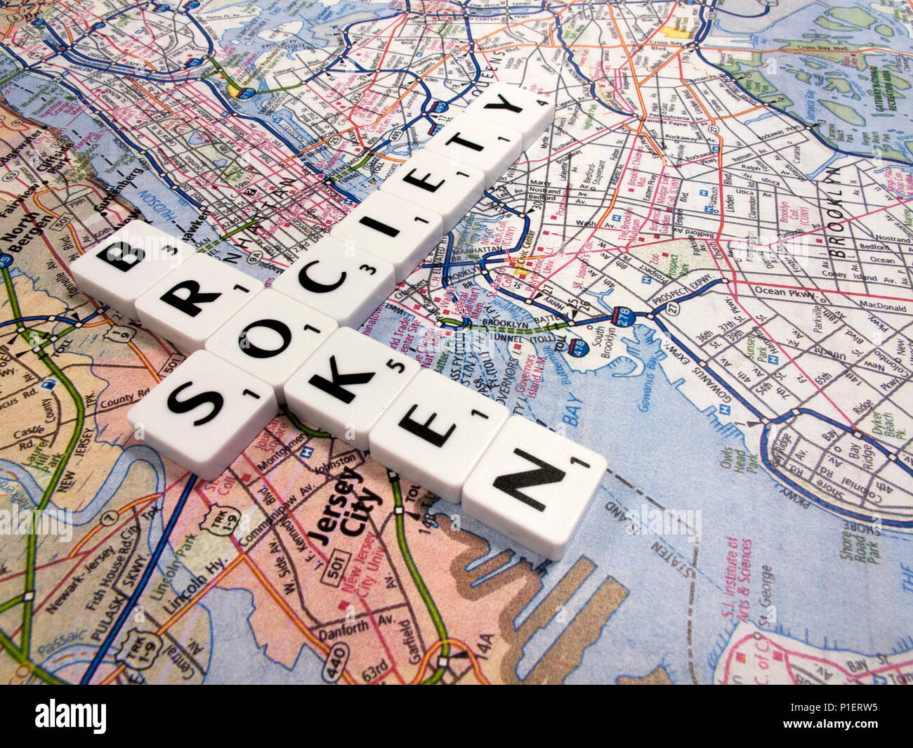 representation of broken society, a perceived or apparent general decline in moral values, with New York map background Stock Photo