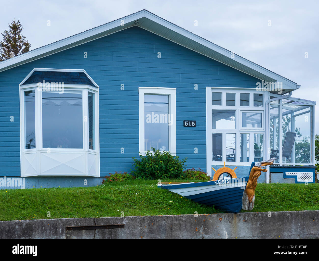 House with a boat coming from the lawn, SainteAnnedesMonts, Gaspe