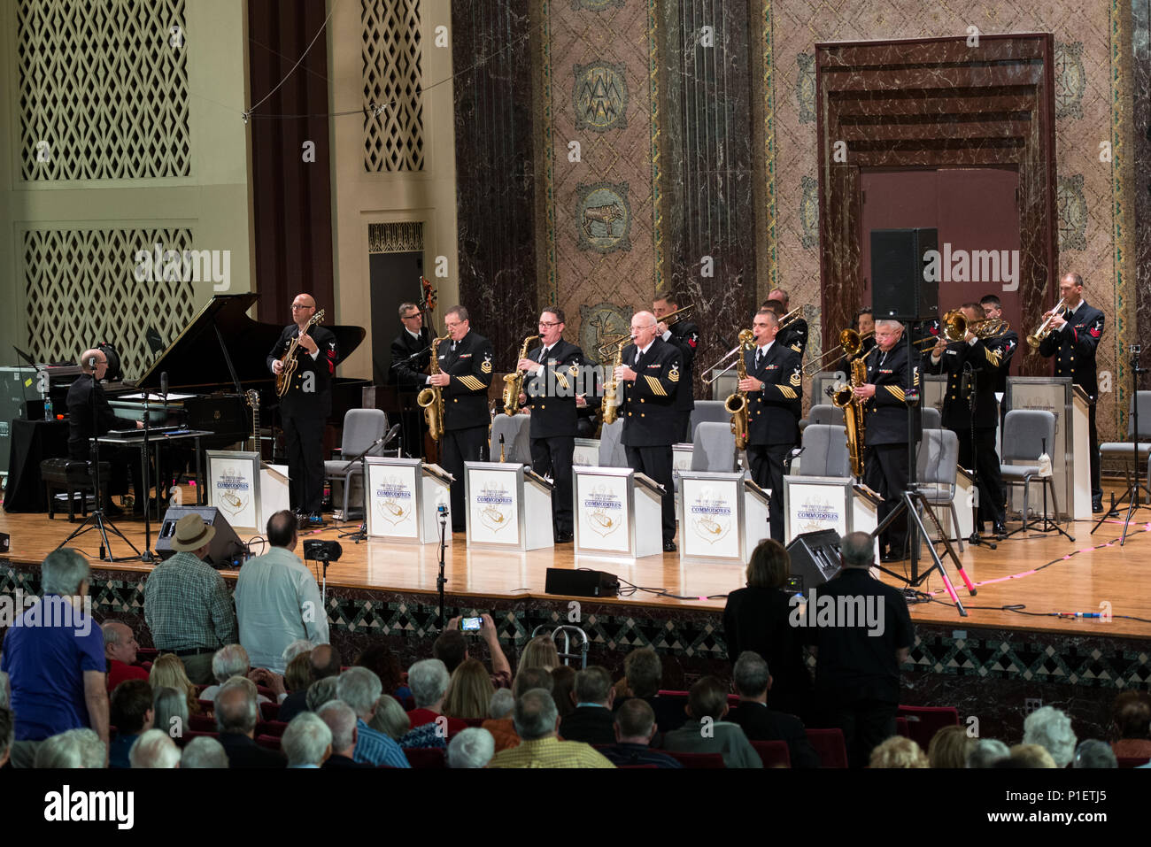 ST. LOUIS (Oct. 23, 2016) Navy veterans stand while the U.S. Navy Band
