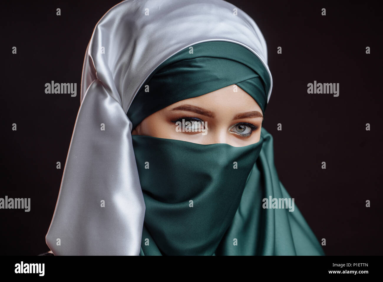 woman wearing Islamic outfit. humility idea. heavenly thoughts Stock Photo
