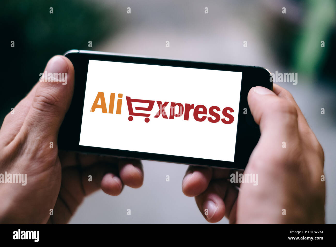 Closeup of iPhone Screen with ALIEXPRESS APP LOGO or ICON Stock Photo